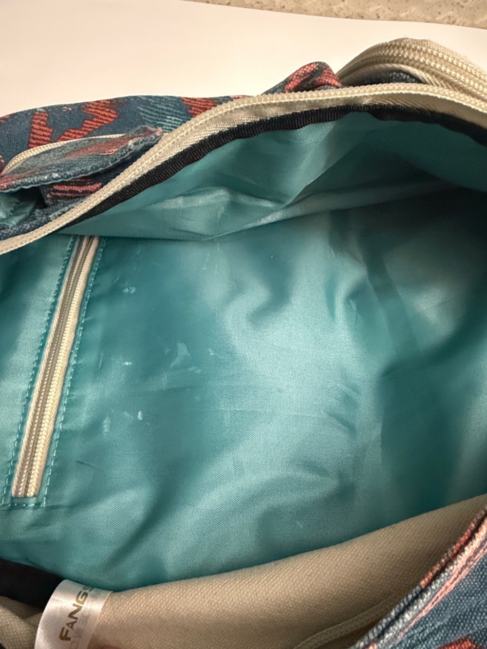 Kavu Teal and Rust Aztec Sling Pack - Picture 5 of 6